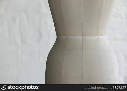 Mannequin indoors, close up, mid section