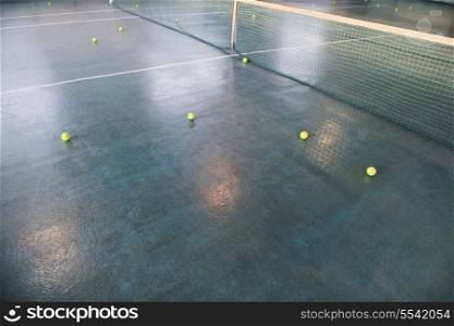 manny tennis bals on indoor sport court