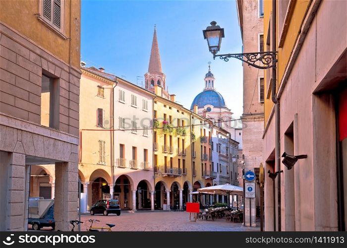 Mantova idyllic italian city street and church towers view, UNESCO world heritage site, Lombardy region of Italy