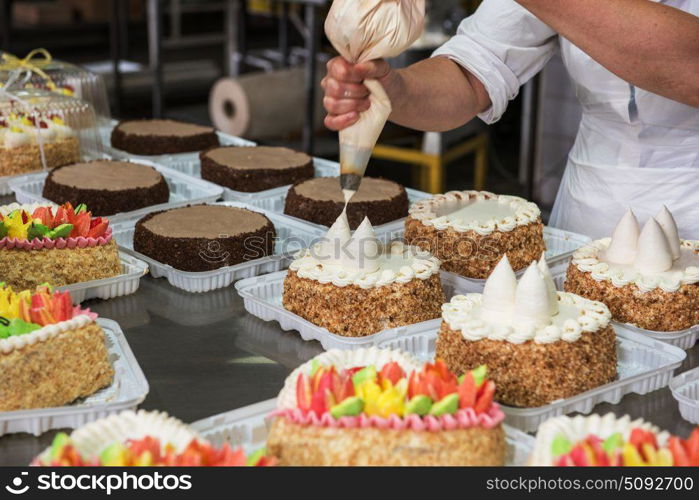 Manual cakes production. Manual cakes production on factory