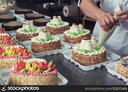 Manual cakes production. Manual cakes production on factory