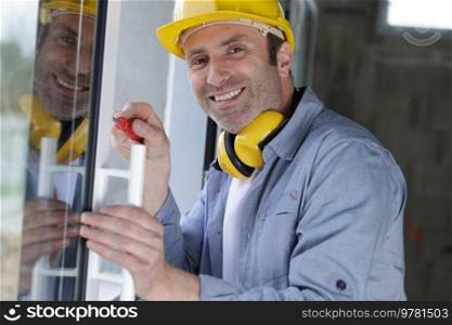 manual worker assembling pvc doors and windows