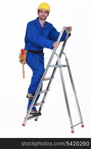 Manual worker climbing ladder