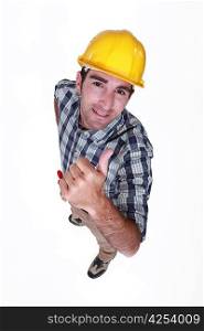 Manual worker giving the thumb up.