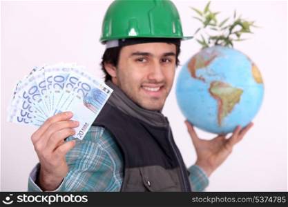 Manual worker holding globe