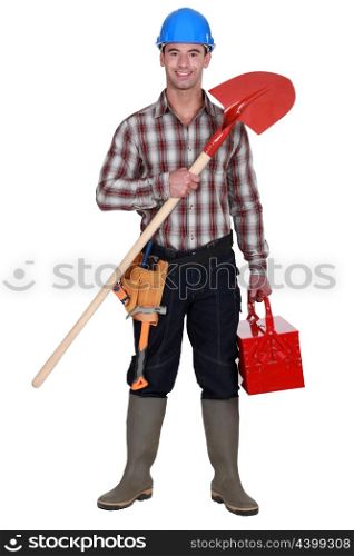 Manual worker holding spade
