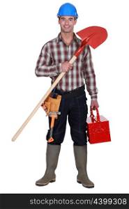 Manual worker holding spade