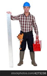 Manual worker stood with tool-box