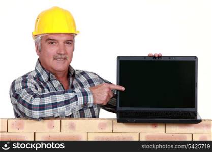 Manual worker with computer