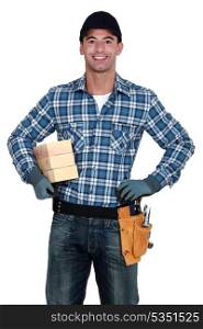 Manual worker with wood