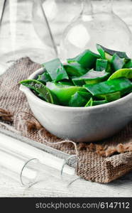 Manufacture of natural cosmetic products from the extract of fresh aloe leaf. Cut a stalk of aloe