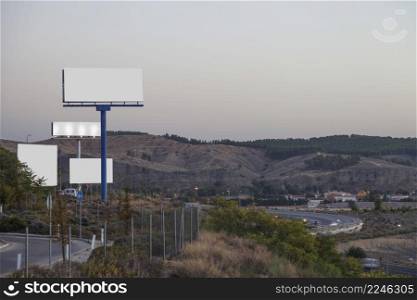 many advertising billboards highway