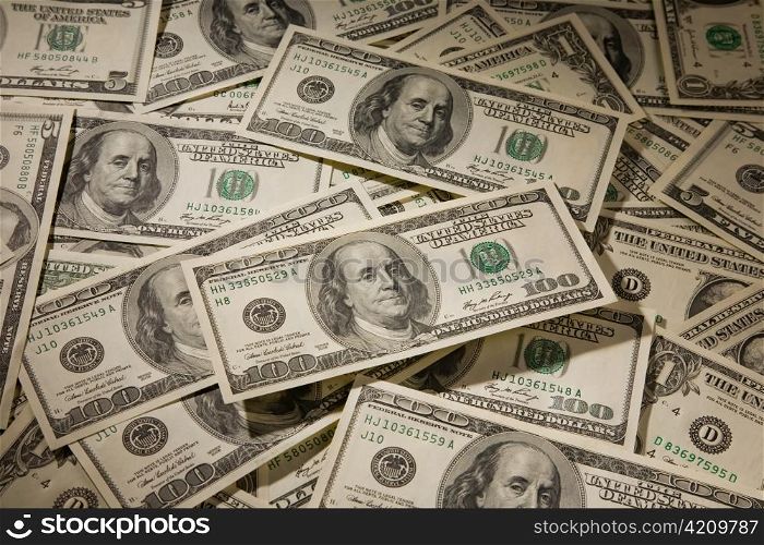many american dollar bills lying side by side. currency of the united states