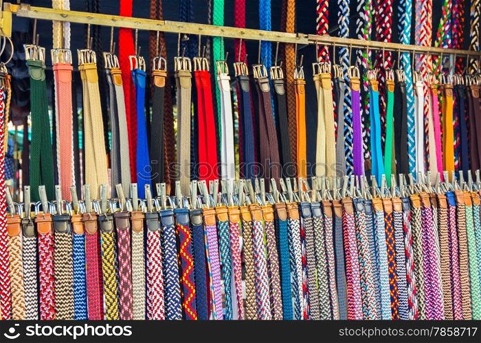 many belts of all types and colors