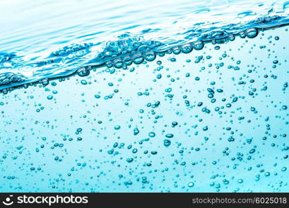 Many bubbles in water close up, abstract water wave with bubbles
