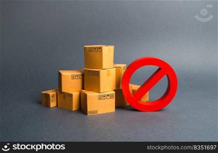 Many cardboard boxes and a red symbol NO. Embargo, trade wars. Restriction on the importation of goods, proprietary for business. Inability to sell products, ban on the import. No delivery.