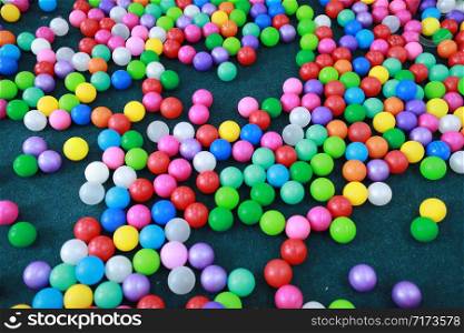 Many colorful plastic balls on children&rsquo;s playground.. Many colorful plastic balls on children&rsquo;s playground