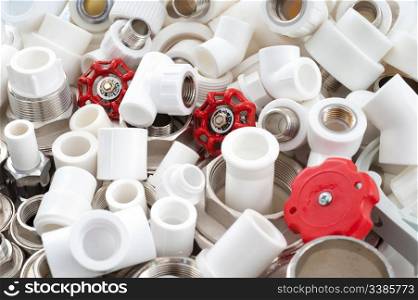 many combined fittings for metal and PVC pipes, unions and valves