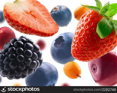 Many different berries in the form of a frame on a white background.. Many different berries in the form of a frame on a white background
