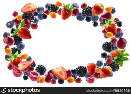 Many different berries in the form of a frame on a white background.. Many different berries in the form of a frame on a white background