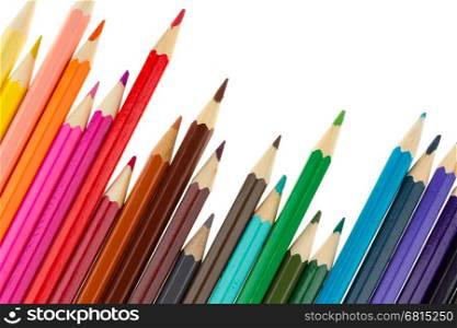 Many different color pencils isolated on white