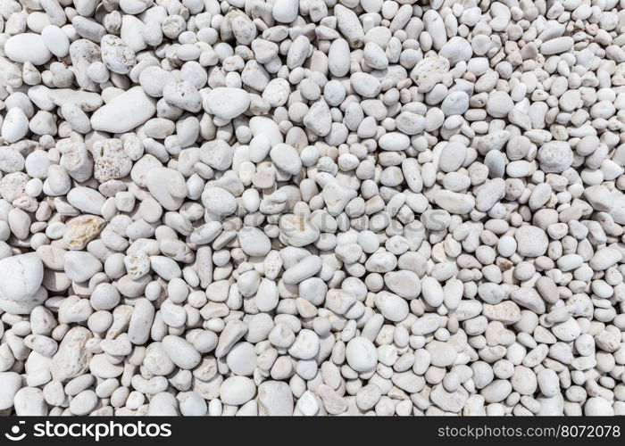 Many different sized grey stones as background