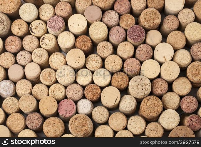 many different wine corks in the background, texture