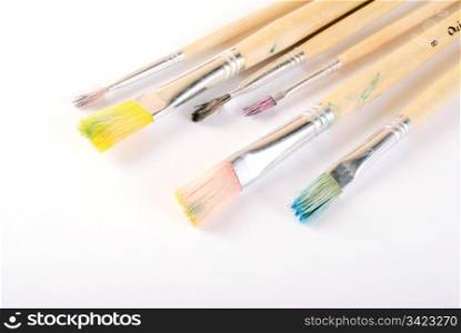 many dirty artificial brushes. closeup