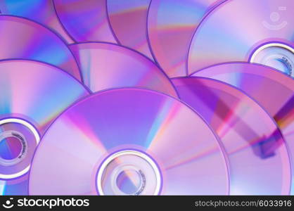Many DVD&rsquo;s arranged at the white background