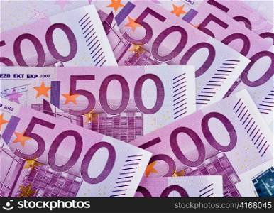 many euro banknotes are next to each other. photo icon for wealth and taxes