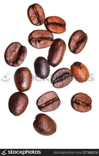 many falling roasted coffee beans isolated on white background