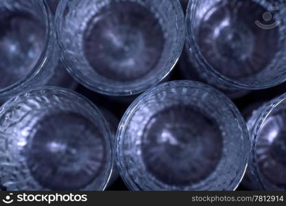 many glasses isolated on dark background