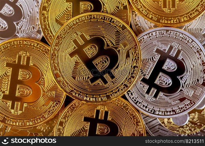 Many golden bitcoins. Cryptocurrency and virtual money concept. Shiny coins with bitcoin symbol. Many golden bitcoins. Cryptocurrency and virtual money concept
