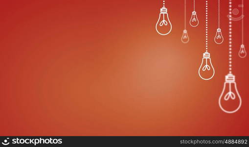 Many light bulbs on color background hanging from above. Hanging bulbs