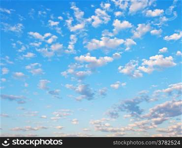 many little white clouds in summer blue sky
