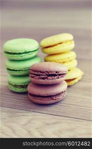 Many Macaroons of different colors on Table