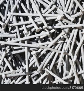 Many nails piled together.