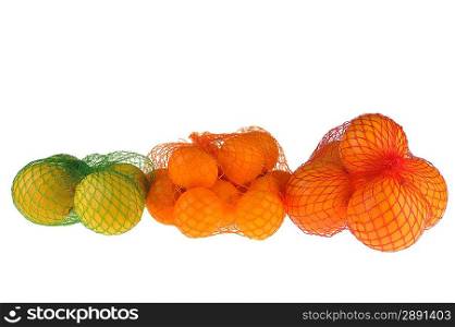 many orange, tangerine and lemon on white background