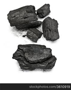 many pieces of charcoal isolated on white background