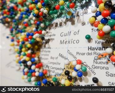 many pins on a maps surrounding gulf of mexico
