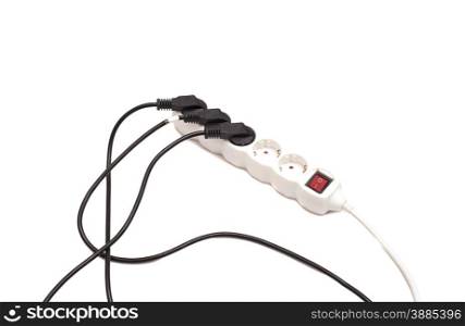 Many plugs plugged into electric power bar isolated on white