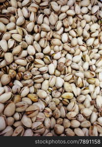 Many shelled pistachios may be used as background