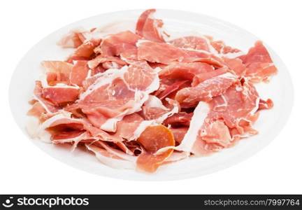 many slices of dry-cured ham on white plate isolated on white background