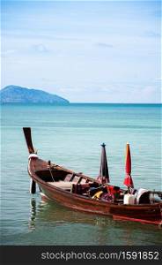 Many Thailand colourful longtail fishing boat Chalong bay during monsoon season in Phuket
