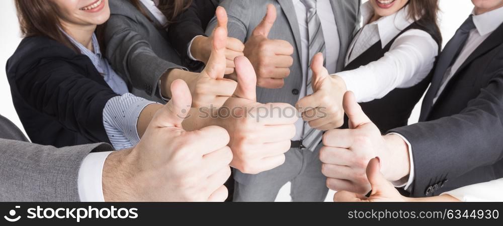 Many thumbs up. Cheering business people holding many thumbs thumbs up closeup