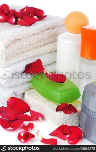 many towels and accessories to bathing lie on table