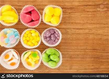 Many types of candies placed in small bowls by type and color&#xA;