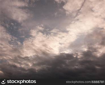 Many White and Stormy Clouds in Overcast Sky with Some Blue and light