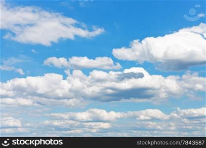 many white fluffy clouds in blue sky