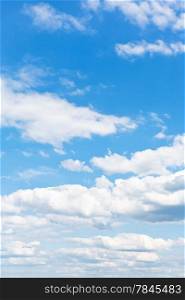 many white puffy clouds in blue sky